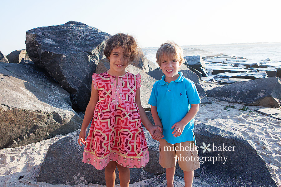 twin siblings on beach