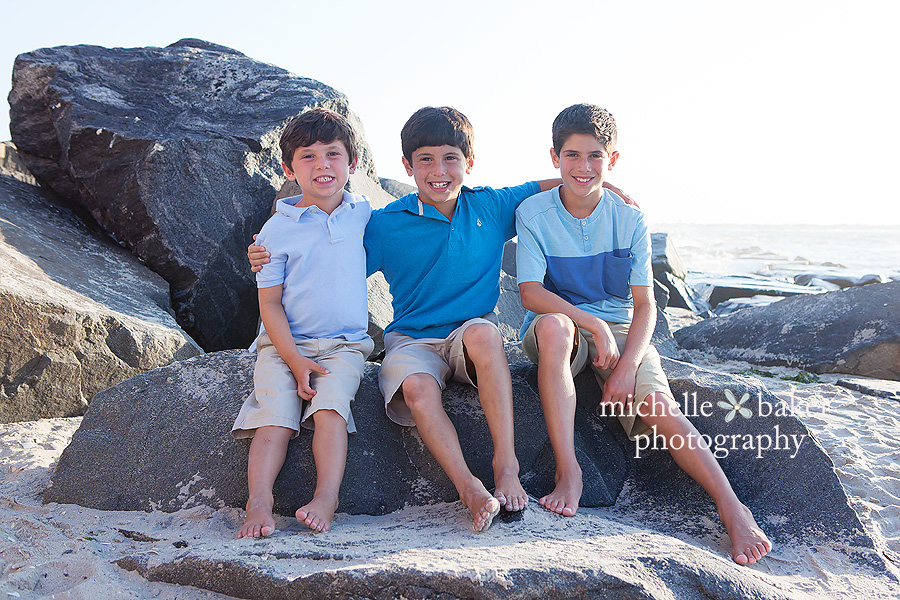 3 sibling boys on beach