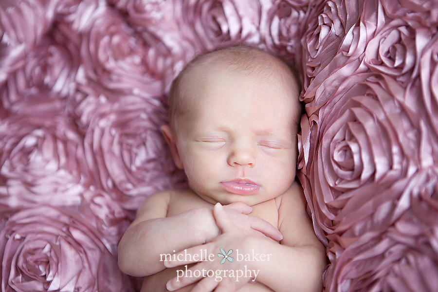Newborn baby with pink