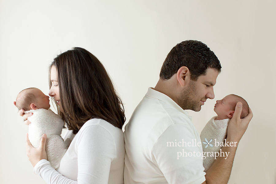 twin sisters with parents