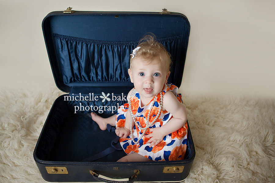 8 month baby in suitcase