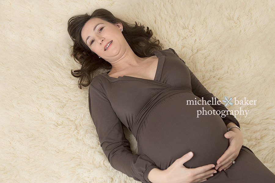 pregnant momma laying on floor