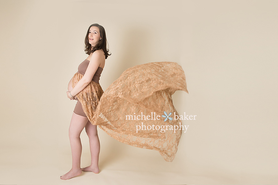 pregnancy lady in flowing brown dress