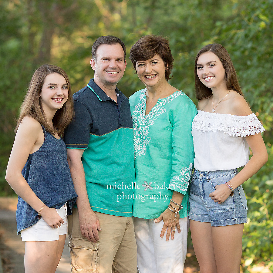 family photo session in the green trees