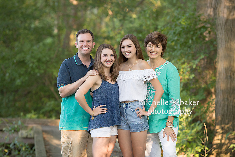 family photo session in the green trees