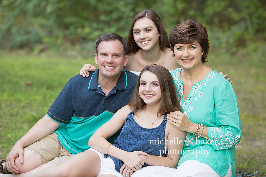 family photo session in the green trees