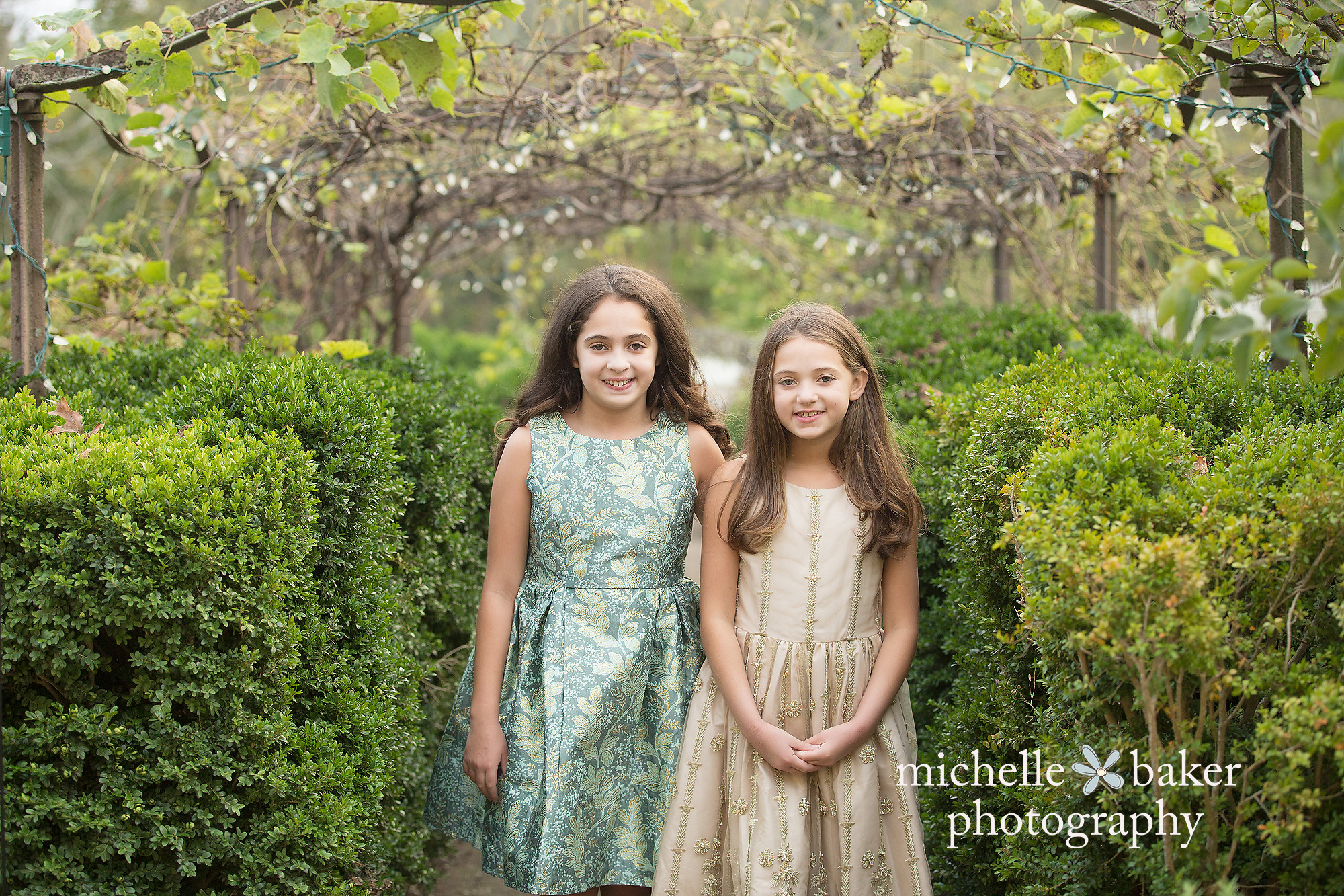 Sisters under a vine gazebo
