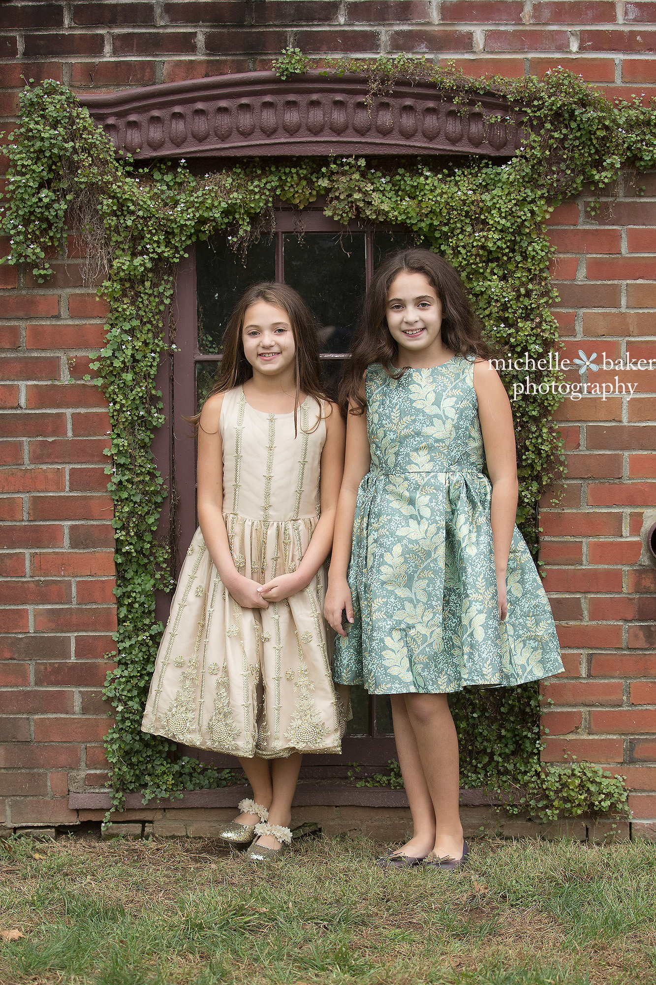 Sisters in an old window with vines